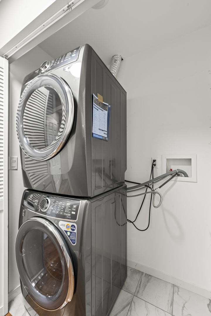 25 McCabe Drive Streamwood, IL 60107 - Photo 24 of 32 a close view of a utility room with dryer and washer