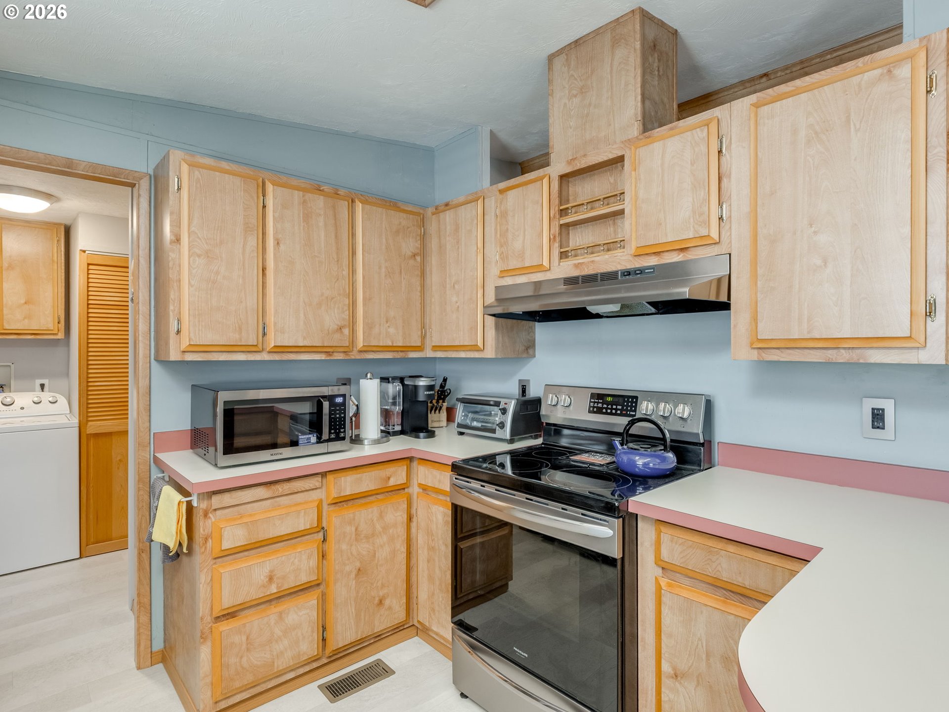 4730 Auburn Road Northeast, Unit 125 Salem, OR 97301 - Photo 9 of 36 a kitchen with stainless steel appliances granite countertop a stove sink and cabinets