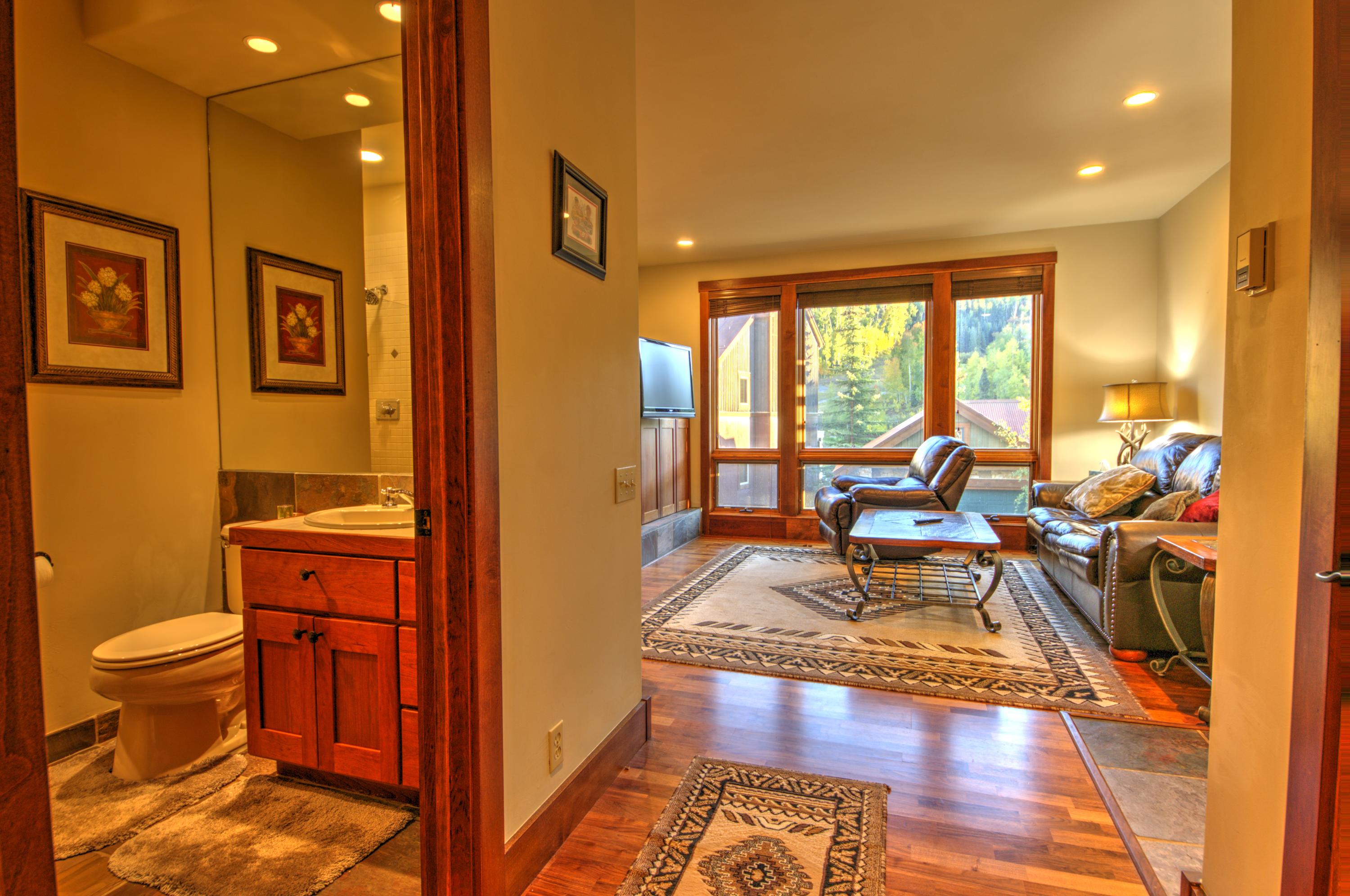 333 Adams Ranch Road, Unit 201 Mountain Village, CO 81435 - Photo 5 of 18 View towards living room from the hallway.