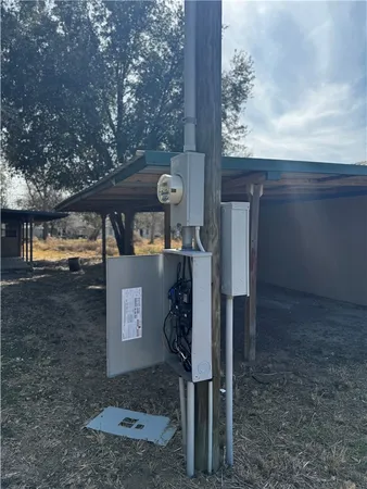 a front view of a house with trees