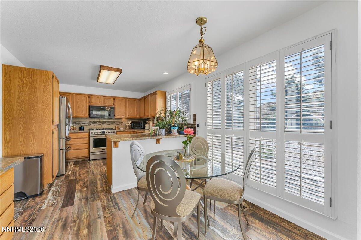 10 Eagle Claw Court Reno, NV 89523 - Photo 16 of 36 a view of a kitchen with furniture and wooden floor