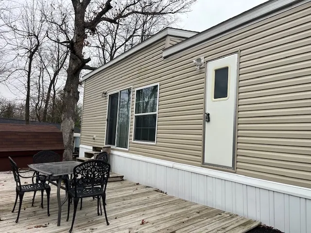 a view of balcony with furniture