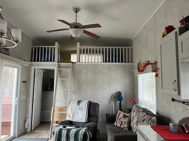 a kitchen with a refrigerator and a sink