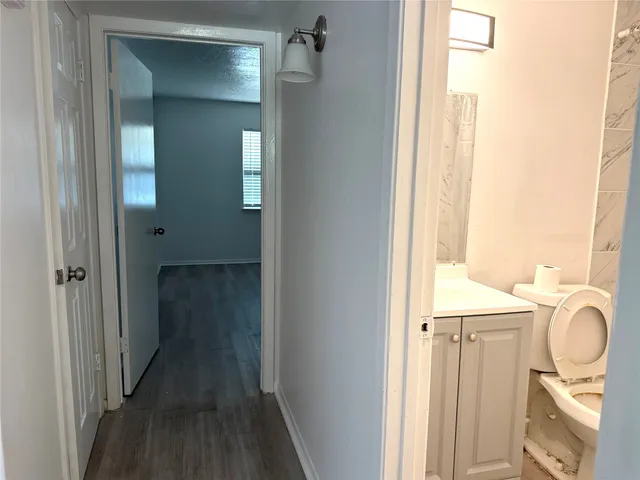 a bathroom with a sink a mirror and a shower