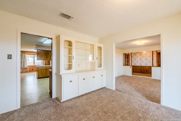 wooden floor and closet in a room