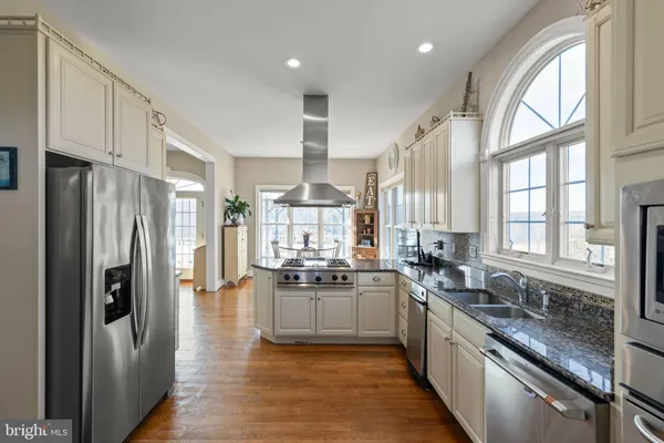 a very nice looking dining room with a table and chairs