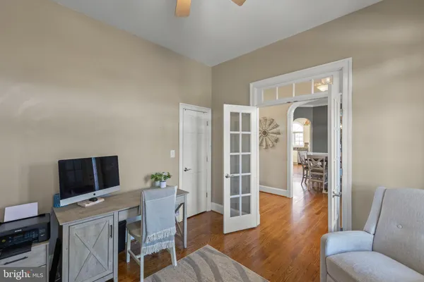 a large bathroom with a glass door shower and sink