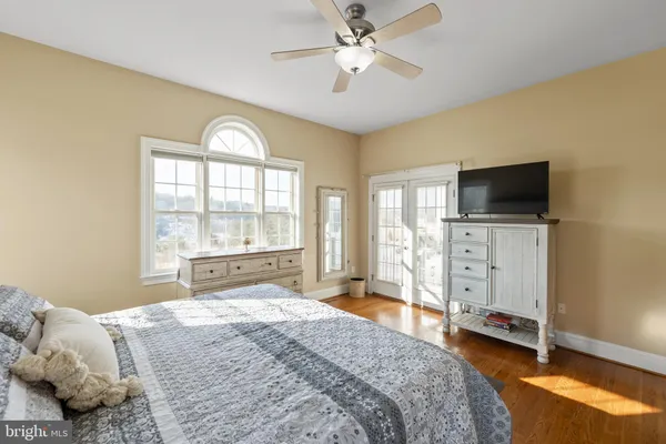 a bedroom with a bed and a cabinets