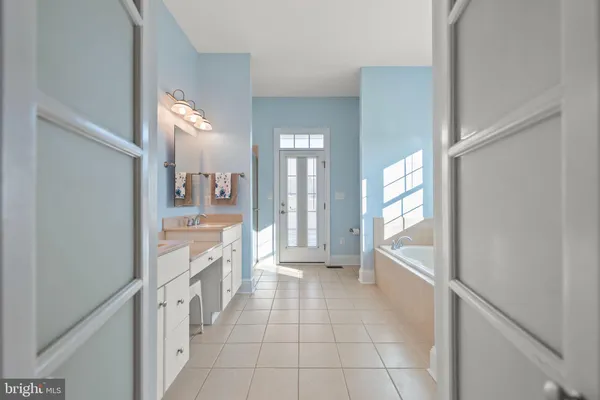 a bedroom with a bed and a closet