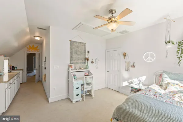 a view of a chair and table in the balcony