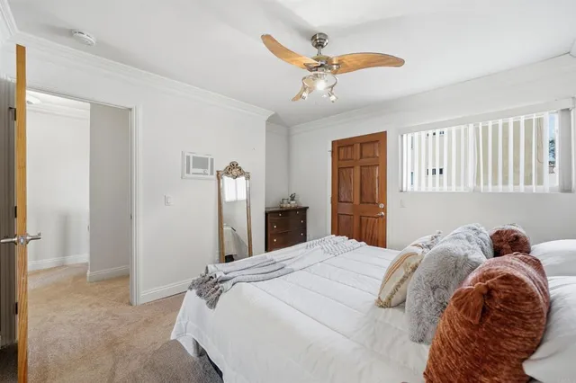 a bedroom with a bed and a closet