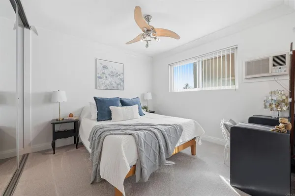 a bed room with a bed and a couch