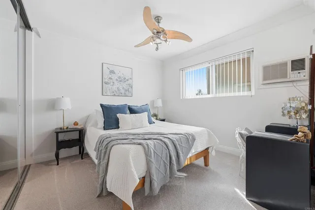 a bed room with a bed and a couch