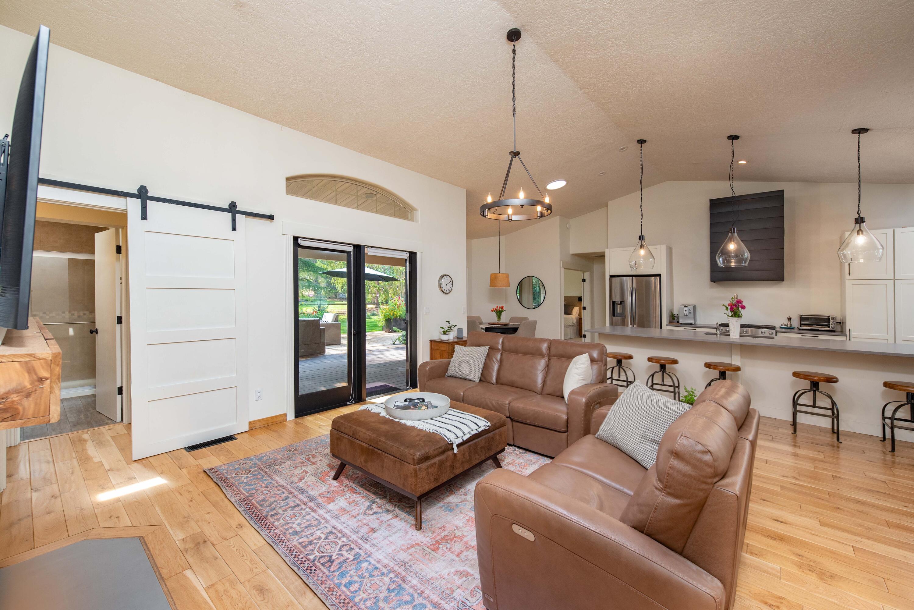 2701 Northwest Strath Way Bend, OR 97703 - Photo 13 of 41 Great room with vaulted ceilings lives large!
