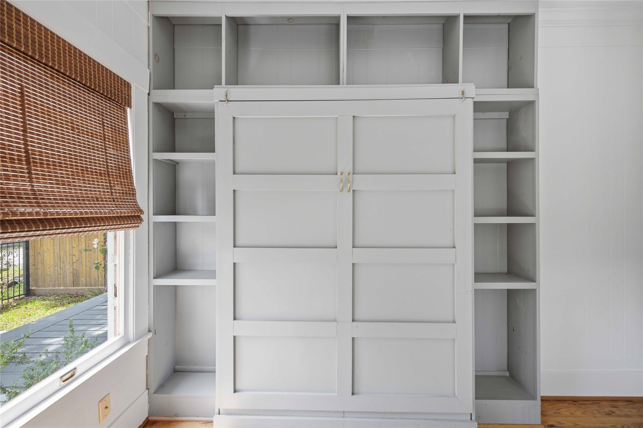 208 Archer Street Houston, TX 77009 - Photo 18 of 26 The Murphy bed when it's tucked away.