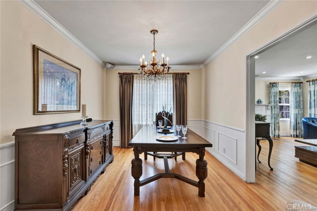 5456 Cadbury Road Whittier, CA 90601 - Photo 9 of 67 a view of a dining room with furniture window and wooden floor