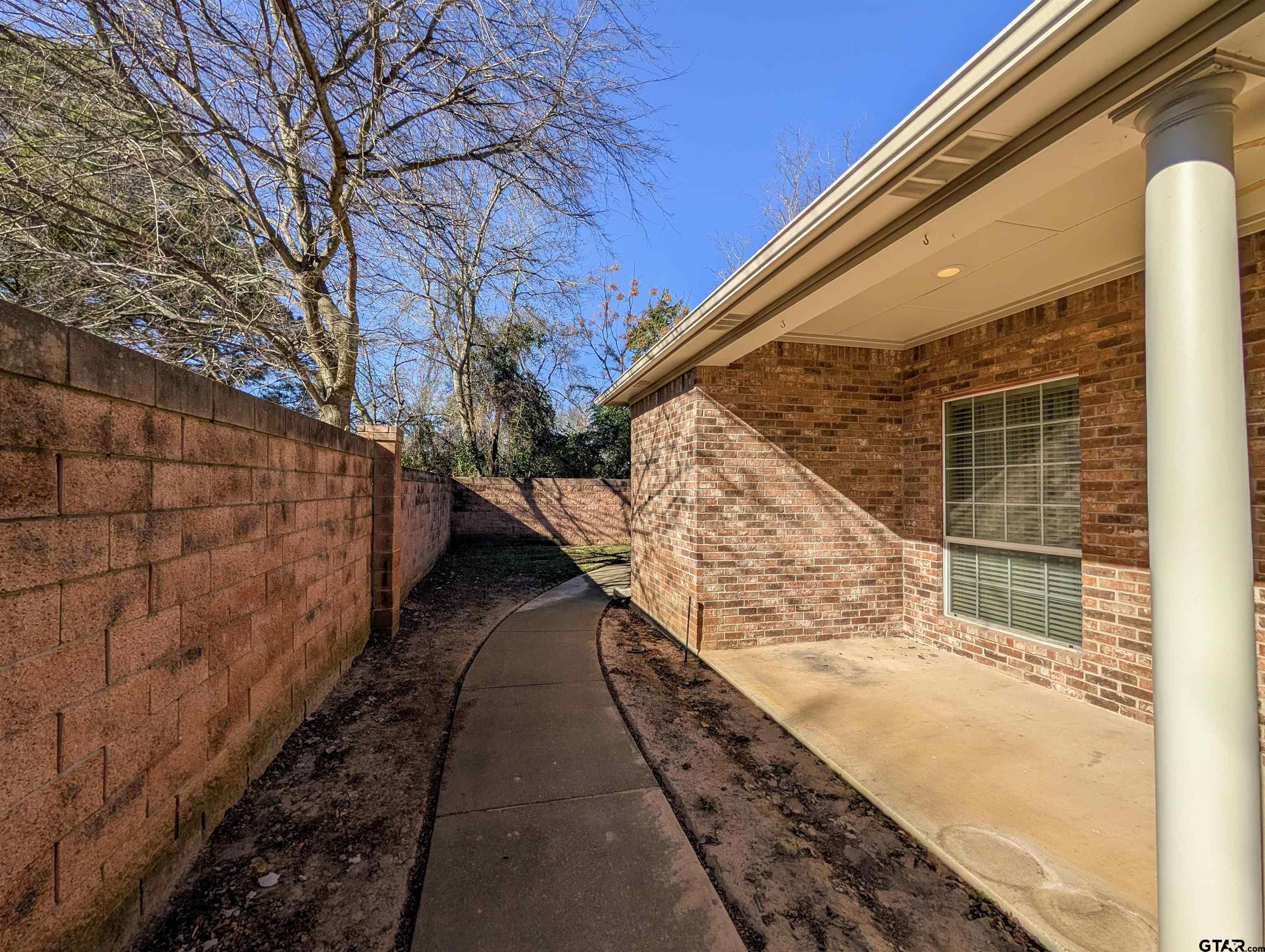 2435 Homestead Lane Tyler, TX 75701 - Photo 31 of 35 a view of balcony with wooden floor and fence and floor