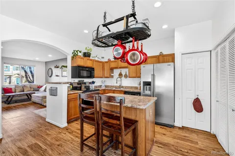 a view of a yard with a large tree