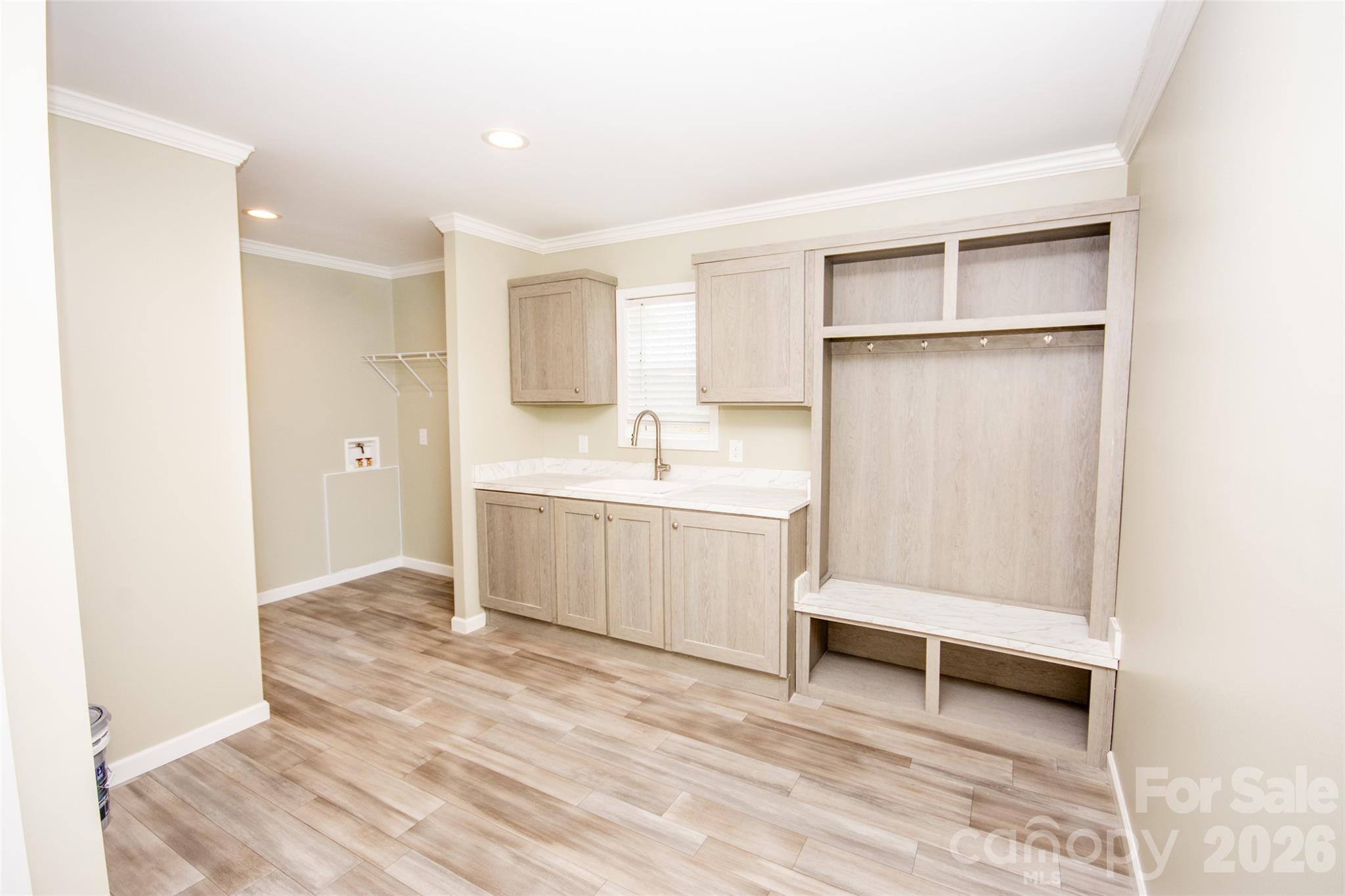 489 Eagle Mills Road Hamptonville, NC 27020 - Photo 17 of 24 a bathroom with a sink a toilet and shower