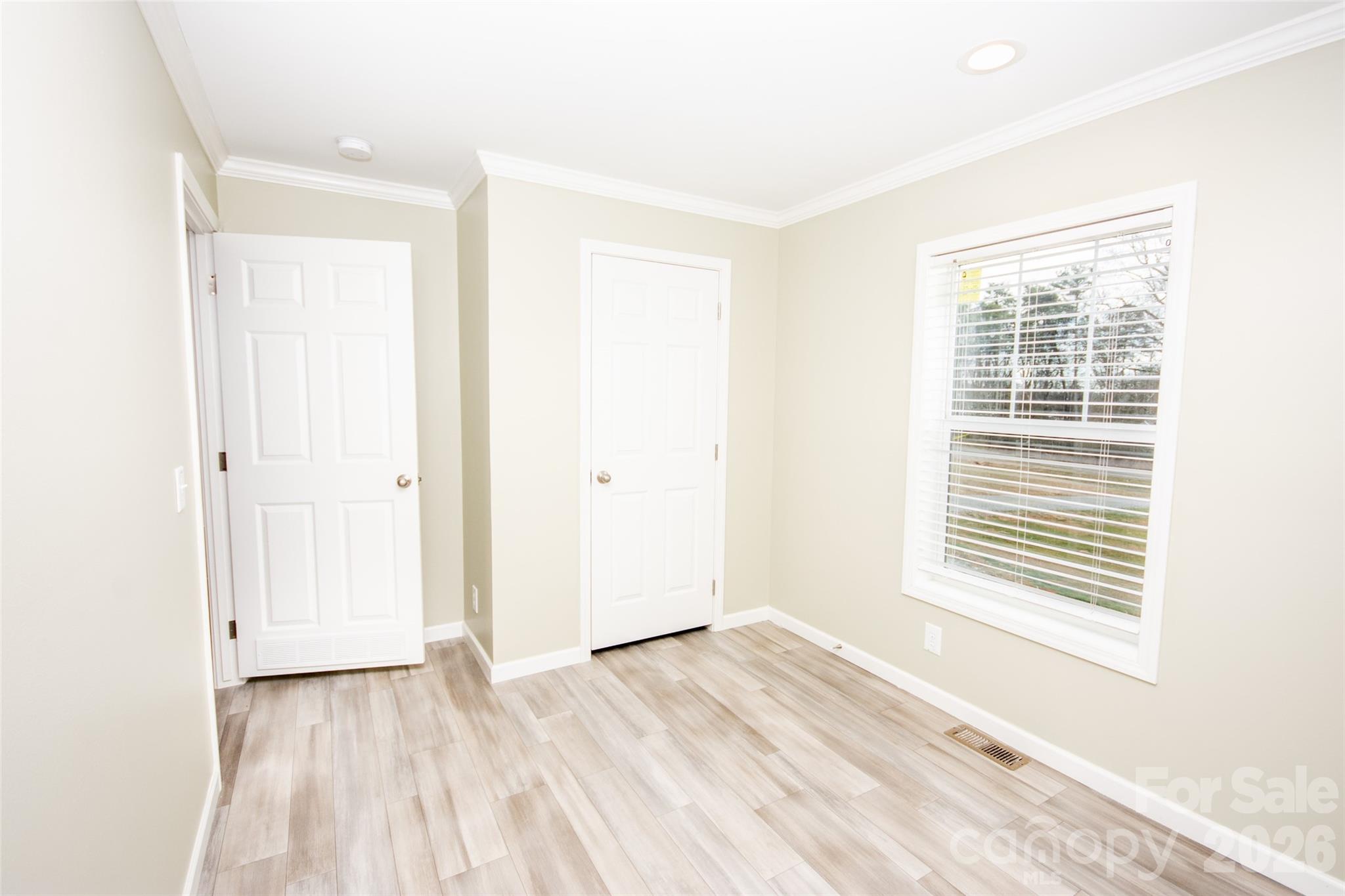 489 Eagle Mills Road Hamptonville, NC 27020 - Photo 21 of 24 a view of a room that has a window in it