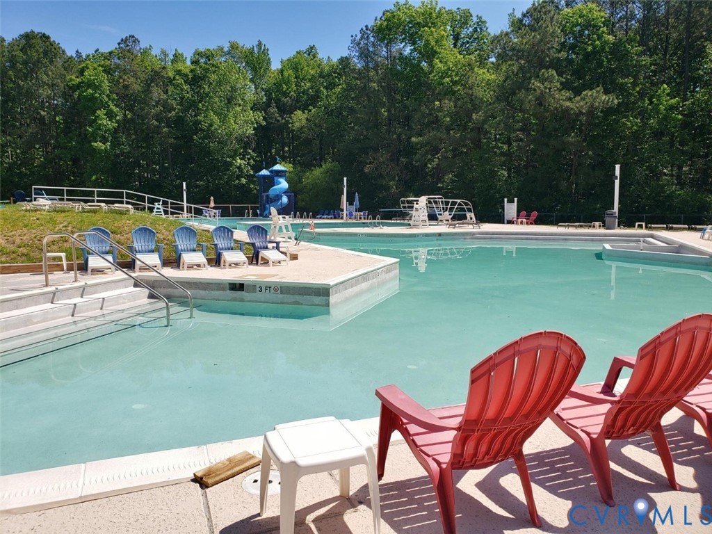 2806 Fairgate Road Midlothian, VA 23112 - Photo 31 of 33 a view of a lake view with a sitting space
