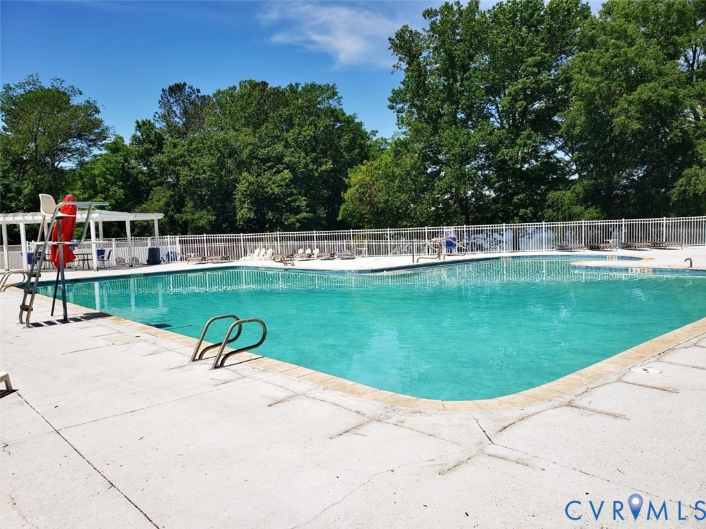 2806 Fairgate Road Midlothian, VA 23112 - Photo 33 of 33 a view of a swimming pool and lounge chairs