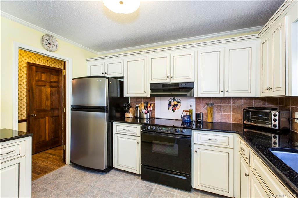 1610 Dunlap Roddey Road Rock Hill, SC 29730 - Photo 8 of 24 a kitchen with a refrigerator stove and sink