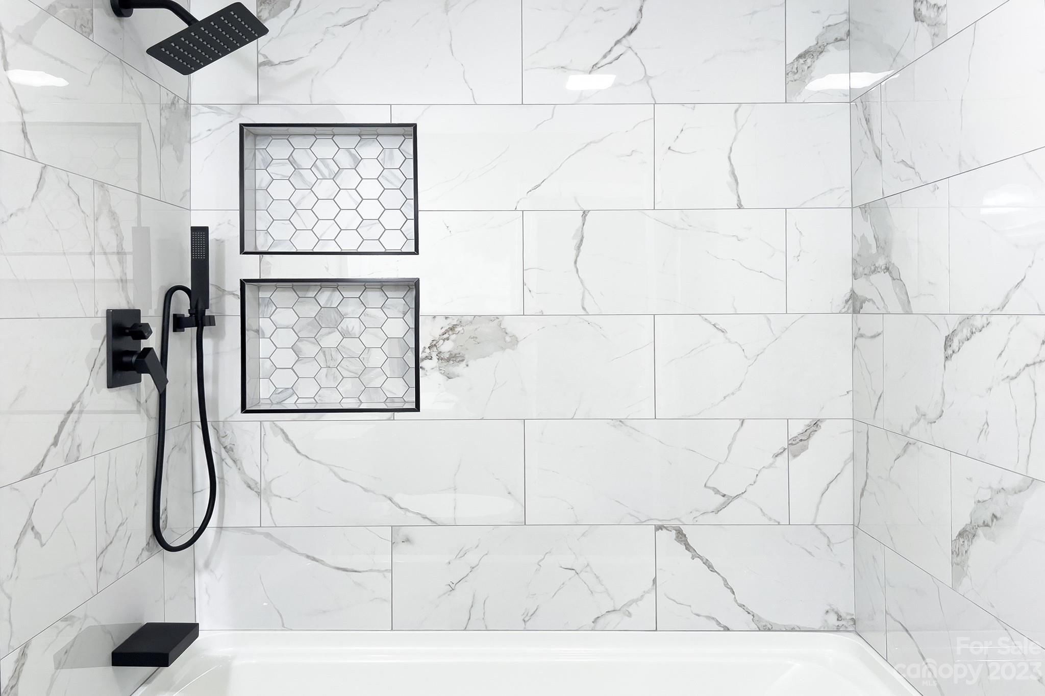 2954 Enfield Road Charlotte, NC 28205 - Photo 18 of 27 a picture of a bathroom with a shower