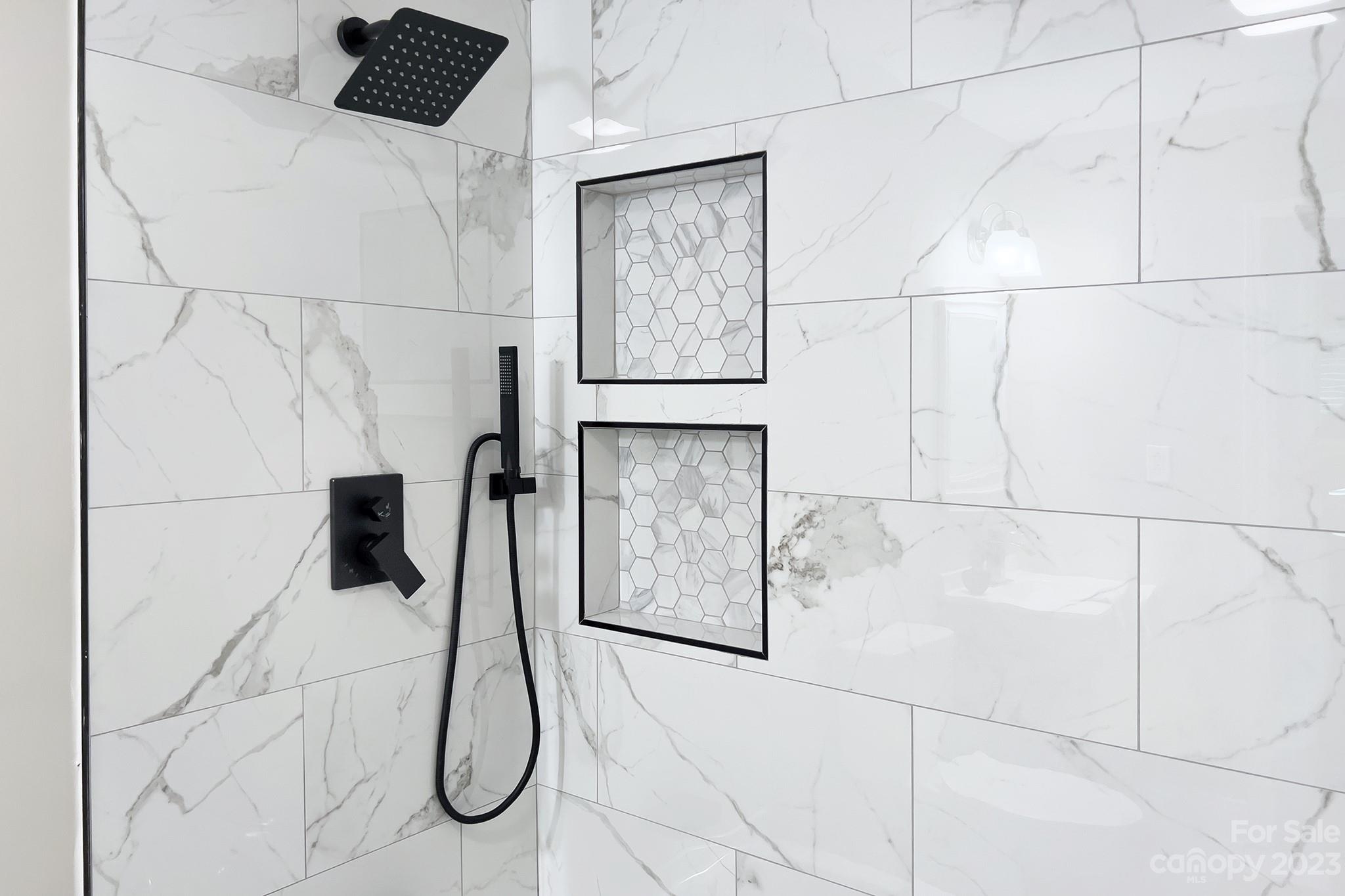 2954 Enfield Road Charlotte, NC 28205 - Photo 19 of 27 a bathroom with a shower