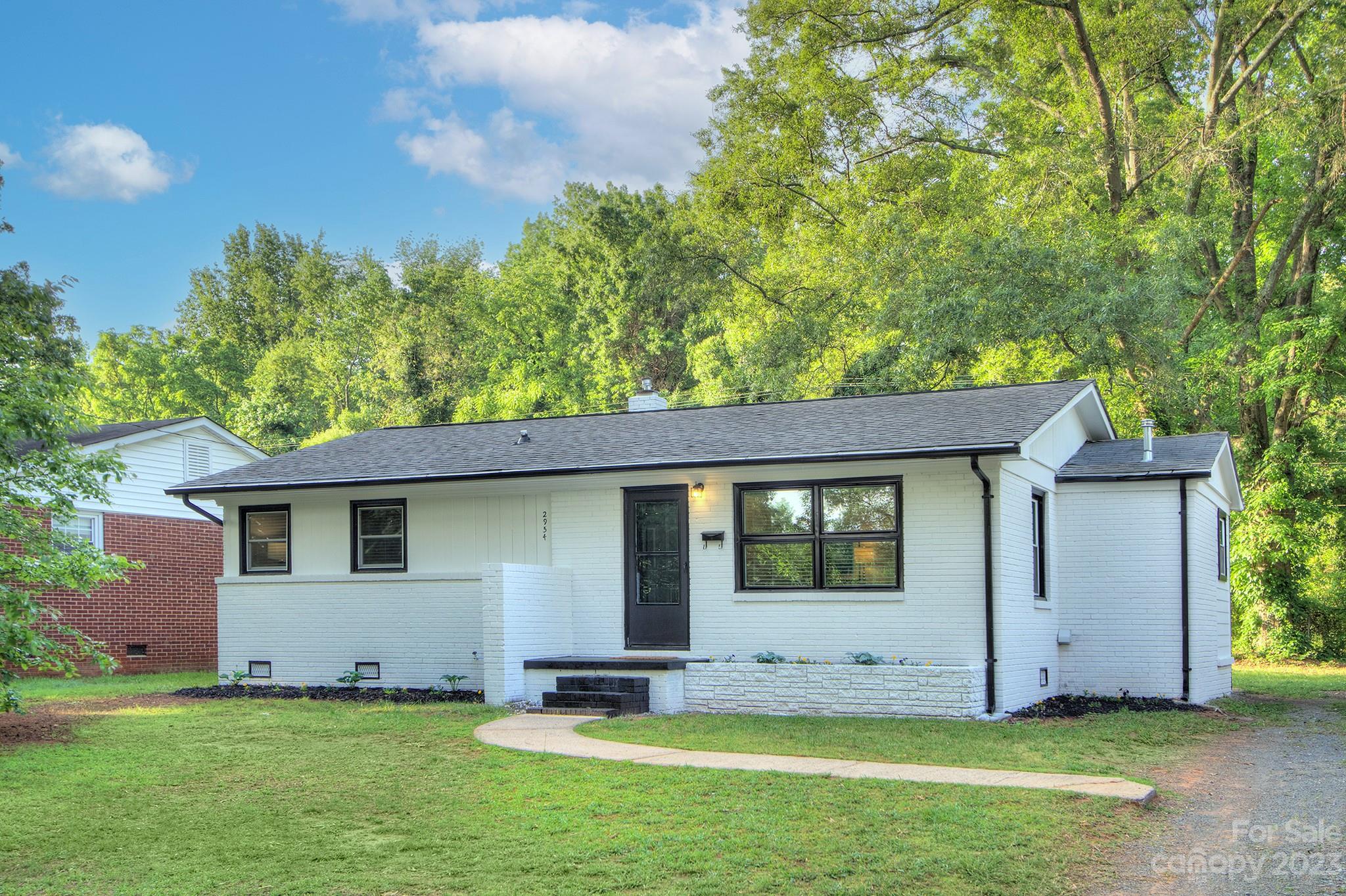 2954 Enfield Road Charlotte, NC 28205 - Photo 26 of 27 a view of a backyard with a garden