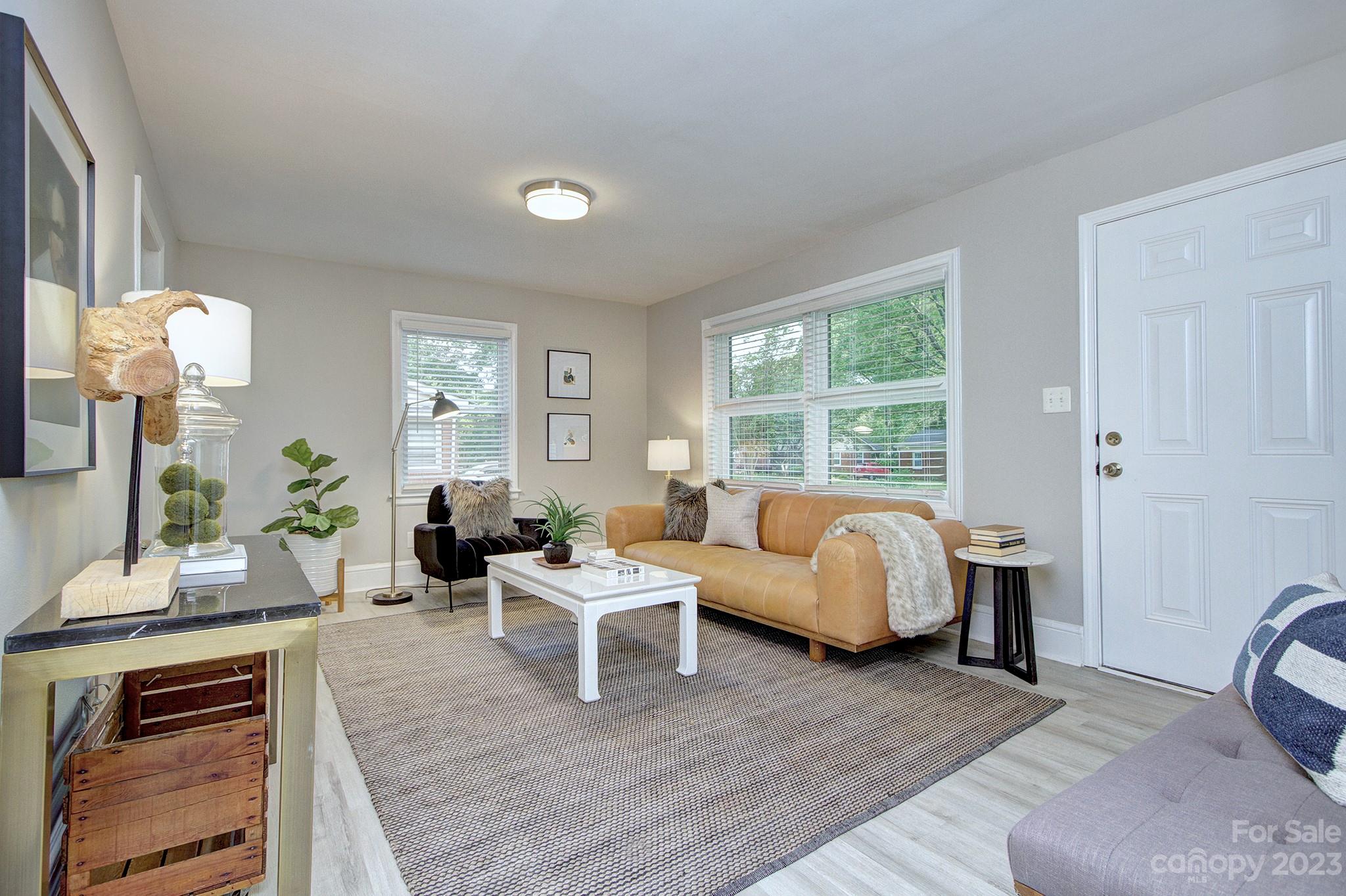 2954 Enfield Road Charlotte, NC 28205 - Photo 3 of 27 a living room with furniture and wooden floor