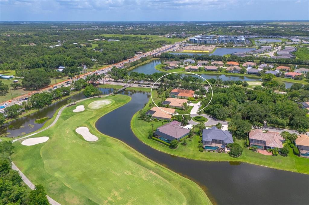 10622 Conch Shell Terrace Bradenton, FL 34212 - Photo 58 of 69 an aerial view of a house with a swimming pool yard and outdoor seating