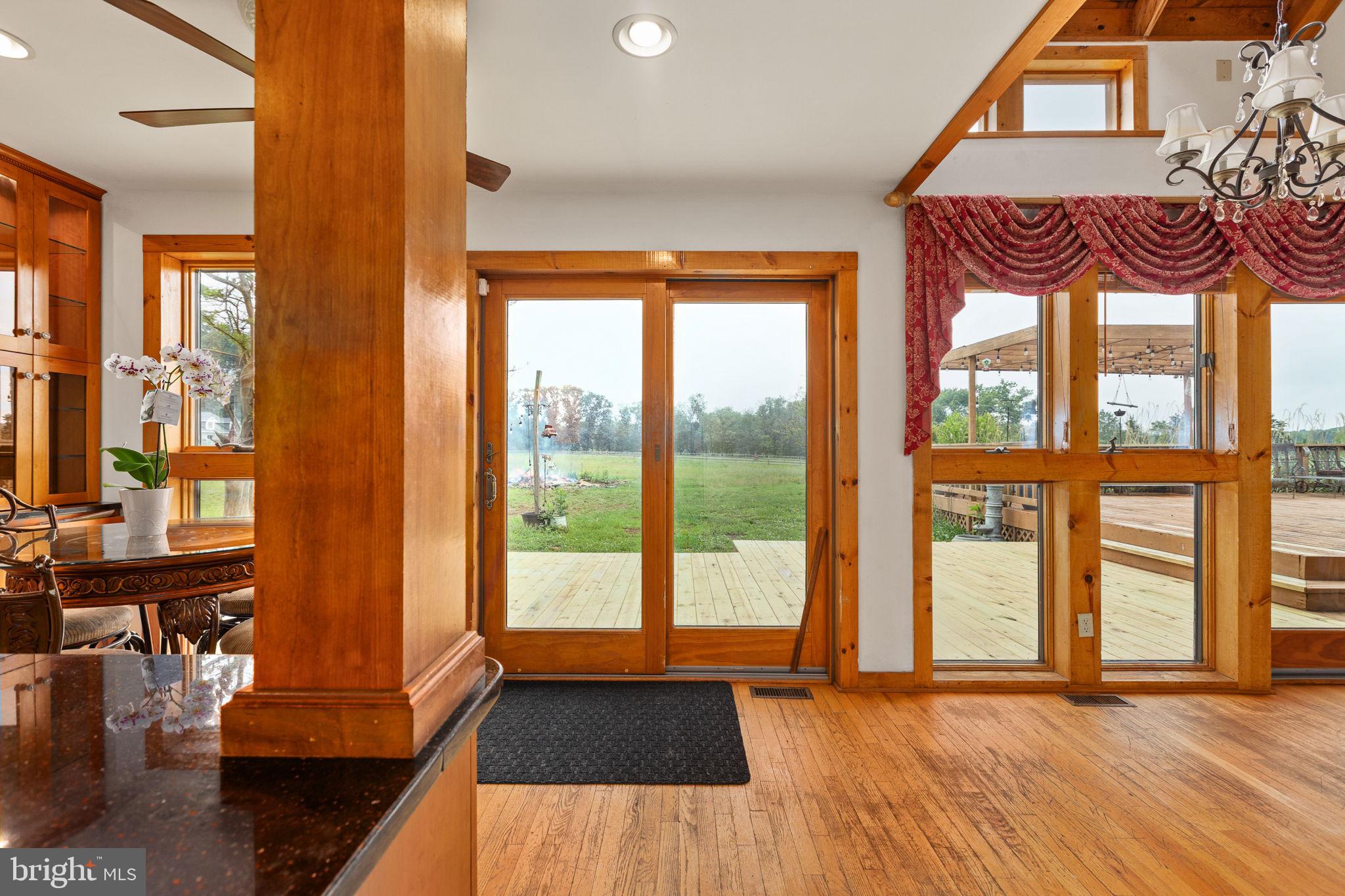 6119 Beach Road Midland, VA 22728 - Photo 48 of 98 a view of front door with balcony and a floor to ceiling window