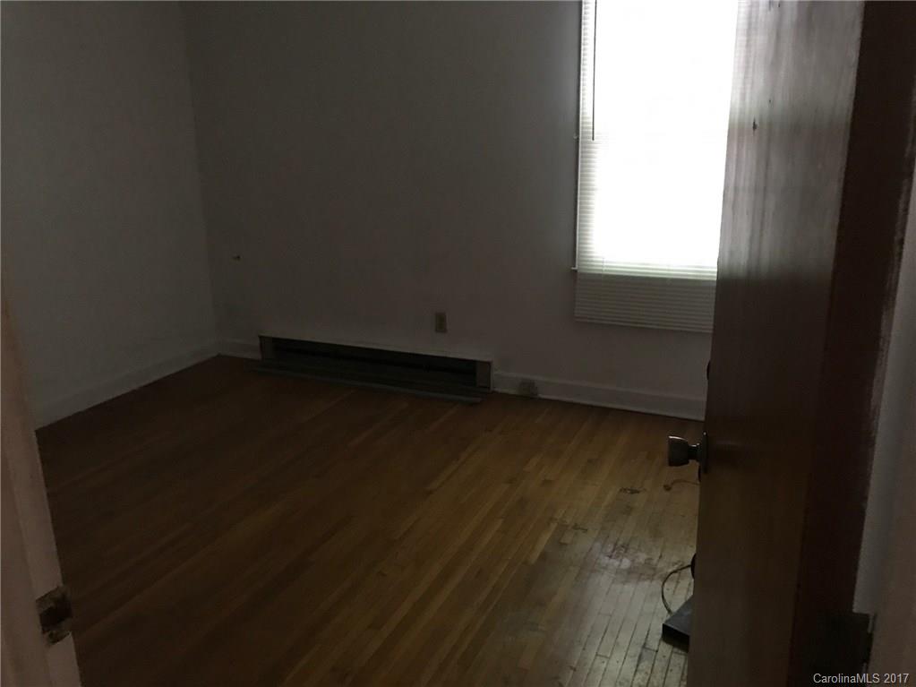 6221 Old Coach Road Charlotte, NC 28215 - Photo 7 of 9 an empty room with a window