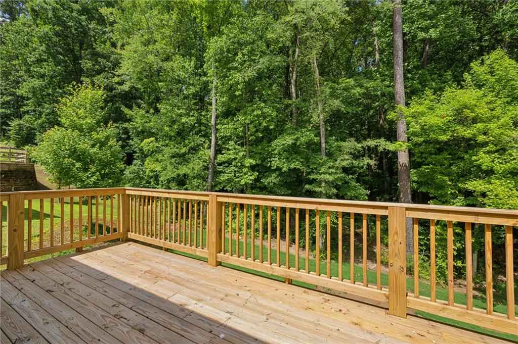 3131 Stonegate Drive Atlanta, GA 30331 - Photo 16 of 28 a view of a wooden roof deck