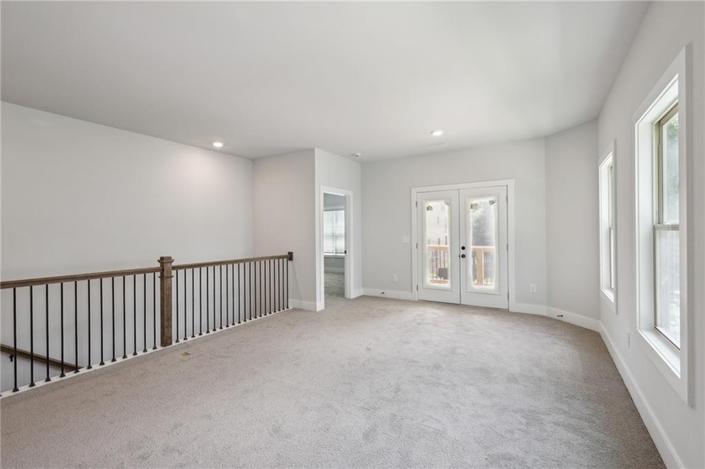 3131 Stonegate Drive Atlanta, GA 30331 - Photo 18 of 28 a view of an empty room with a window