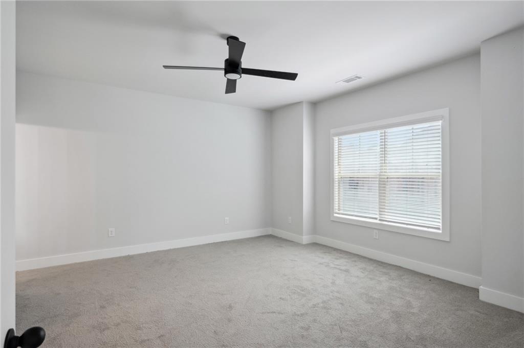 3131 Stonegate Drive Atlanta, GA 30331 - Photo 19 of 28 an empty room with a window