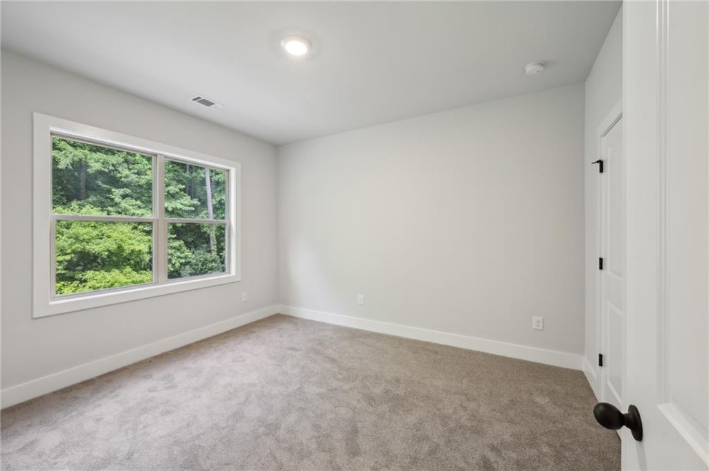 3131 Stonegate Drive Atlanta, GA 30331 - Photo 23 of 28 an empty room with a window
