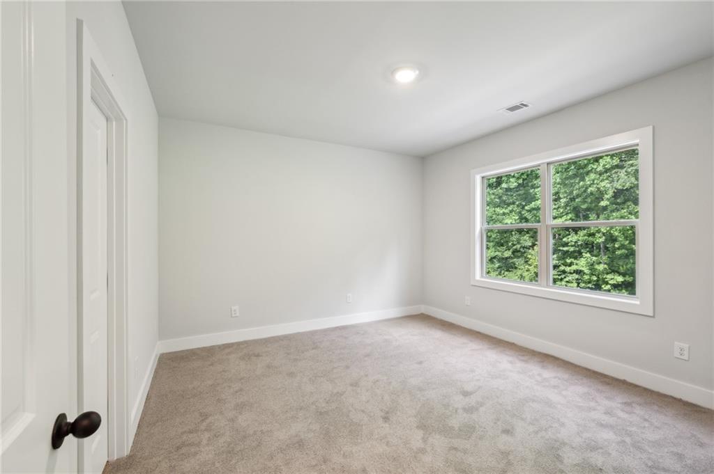 3131 Stonegate Drive Atlanta, GA 30331 - Photo 24 of 28 an empty room with a window