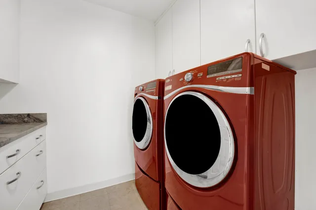 a utility room with dryer and washer