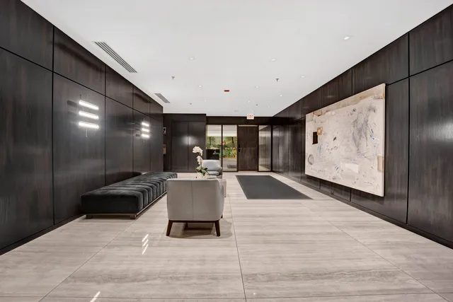 a living room with furniture and window