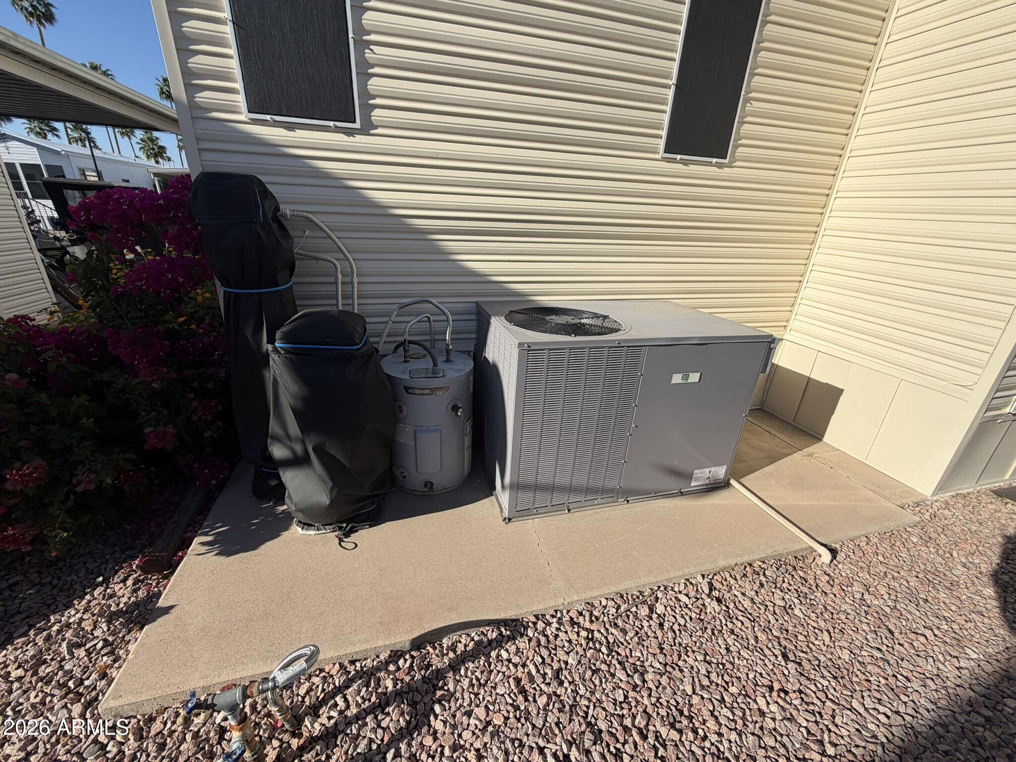 7750 East Broadway Road, Unit 707 Mesa, AZ 85208 - Photo 14 of 17 a view of a house with a backyard
