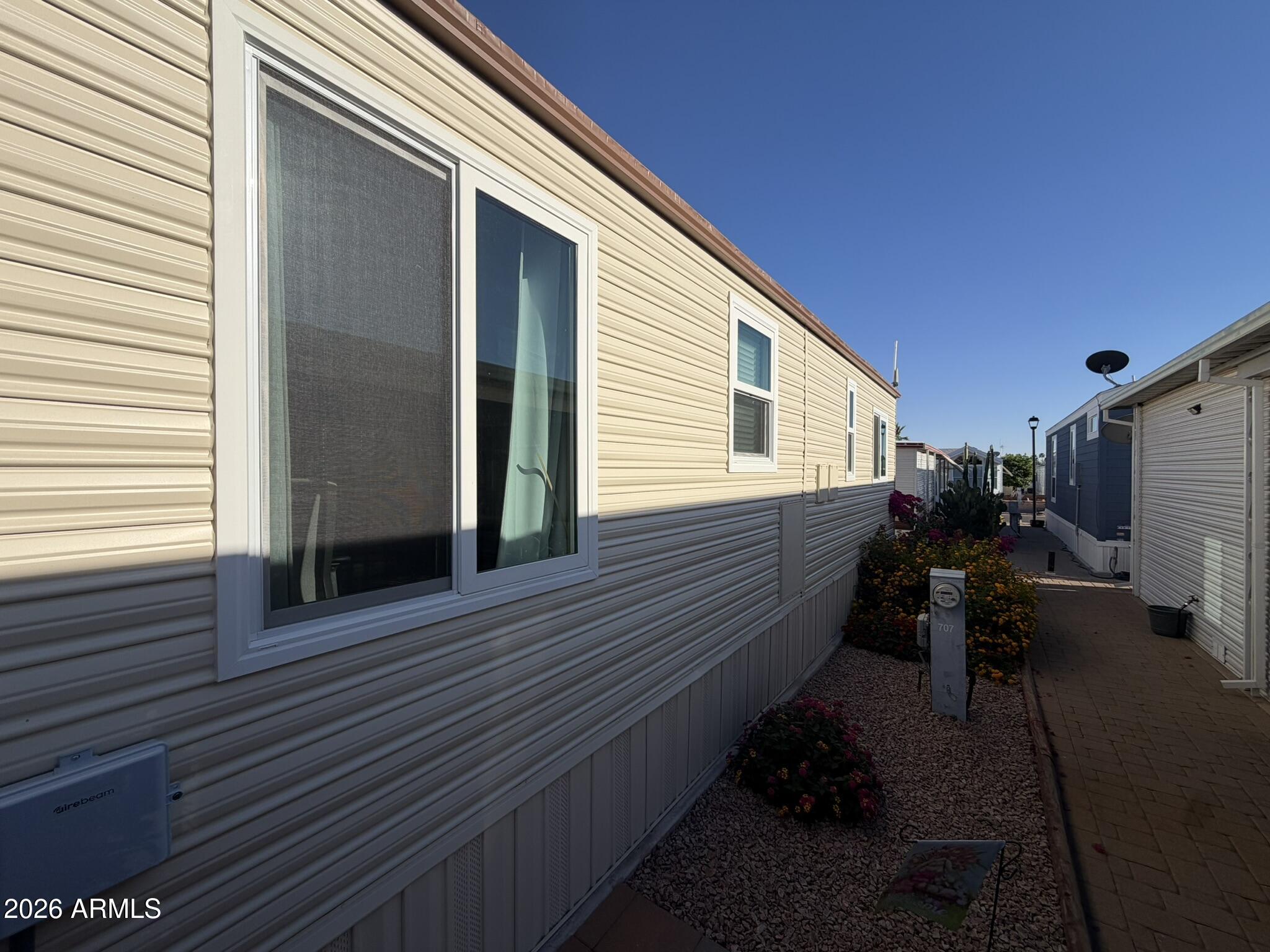 7750 East Broadway Road, Unit 707 Mesa, AZ 85208 - Photo 17 of 17 a view of a back yard of the house