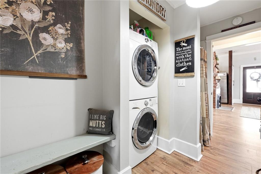 275 Strippling Street Ball Ground, GA 30107 - Photo 21 of 40 a view of entryway with washer and dryer