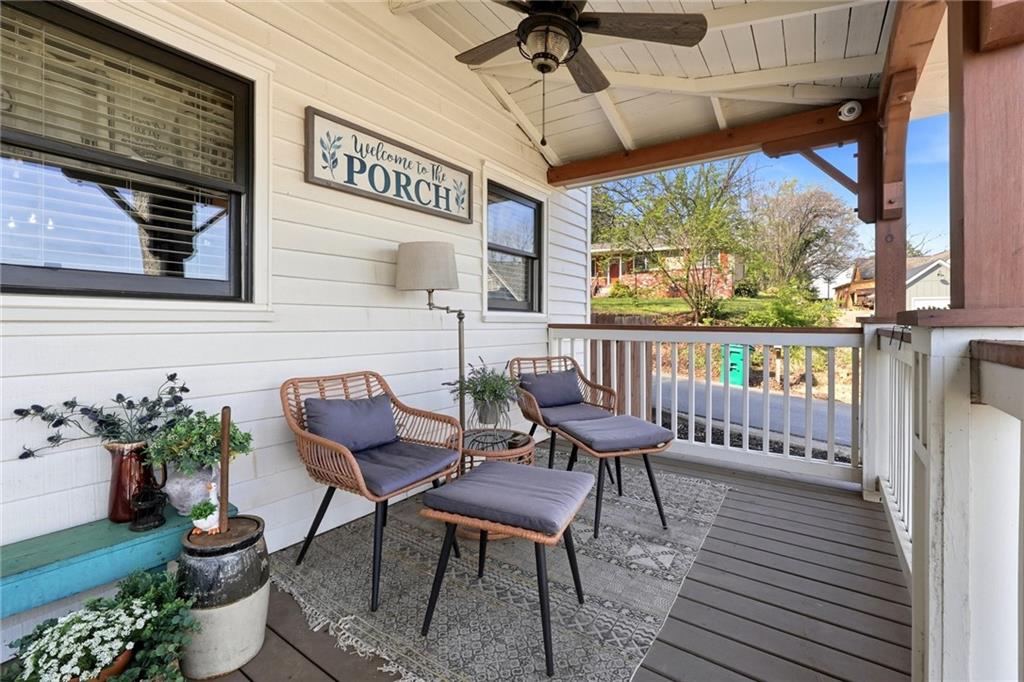 275 Strippling Street Ball Ground, GA 30107 - Photo 3 of 40 a view of a chairs and table in the balcony
