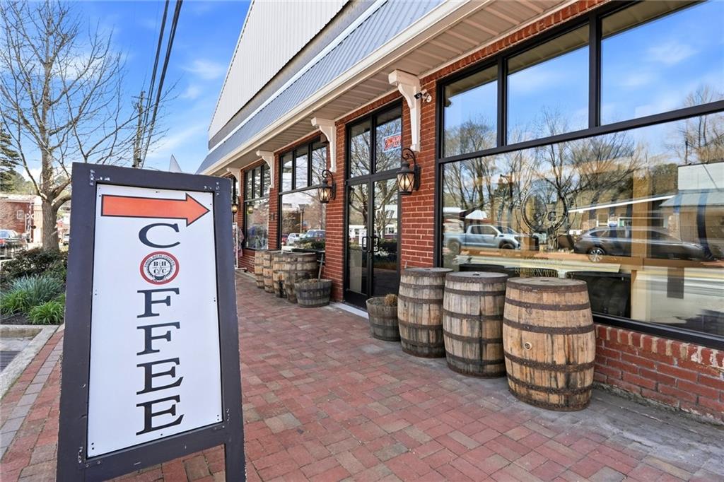 275 Strippling Street Ball Ground, GA 30107 - Photo 33 of 40 a front view of a building with outdoor area