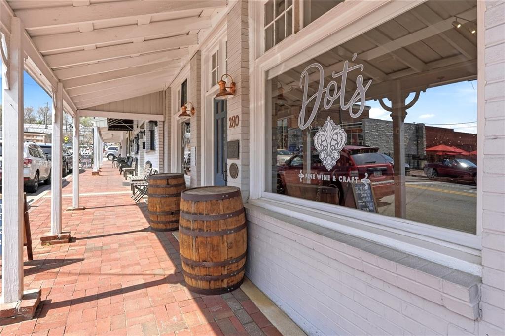 275 Strippling Street Ball Ground, GA 30107 - Photo 35 of 40 a view of a entryway door of the house
