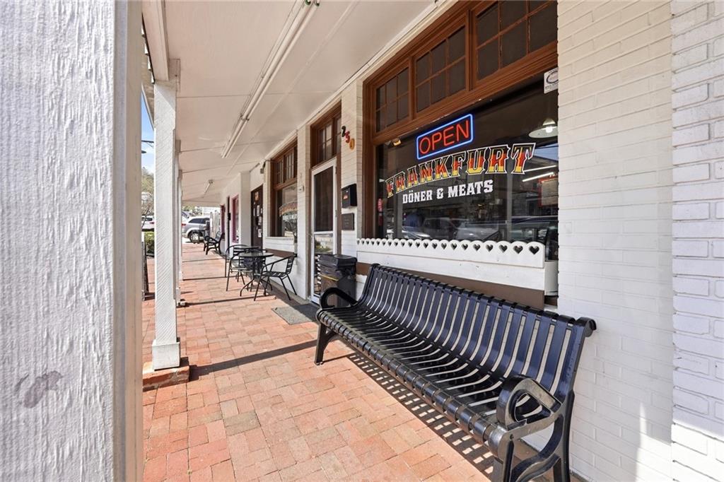275 Strippling Street Ball Ground, GA 30107 - Photo 36 of 40 a view of a patio with a table and chairs