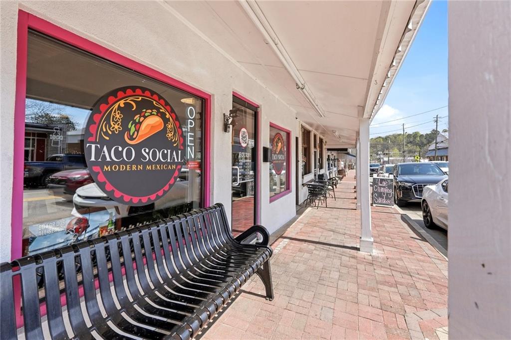 275 Strippling Street Ball Ground, GA 30107 - Photo 37 of 40 a city view with a outdoor seating