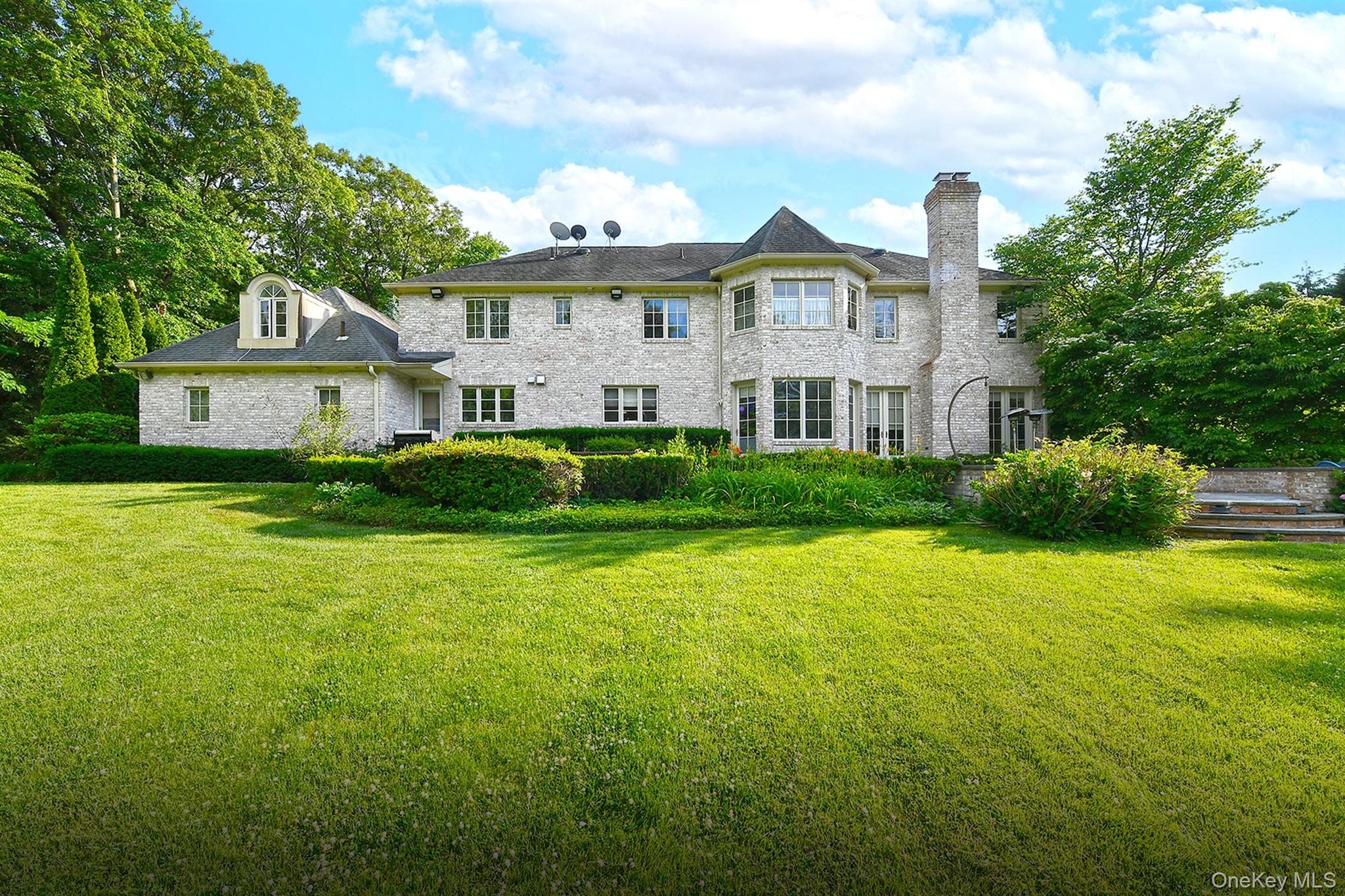 14 Norgate Road Glen Head, NY 11545 - Photo 38 of 44 a front view of a house with garden